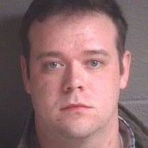 Former Asheville police officer who beat black pedestrian won't face  federal charges