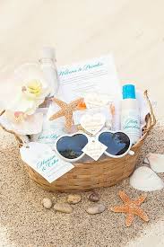 5 Ideas For Your Beach Wedding Welcome Basket Wedding Welcome Baskets Diy Beach Wedding Wedding Welcome Gifts