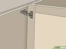 Clipped on the hinge cup. 3 Ways To Adjust Euro Style Cabinet Hinges Wikihow