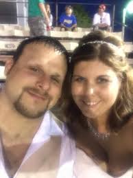 Race fans tie the knot at Auto City Speedway starting line