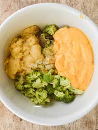 In a 2 quart casserole dish, mix together onion, broccoli, soup, cheese, mayonnaise, eggs, garlic salt, pepper, seasoned salt, and lemon juice. Classic Broccoli And Rice Casserole Sugar Dish Me