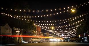 Stroll Through A Canopy Of Christmas Lights On Jenks Main Street Oklahoma S Most Splendid Street Best Christmas Lights Christmas Lights Main Street