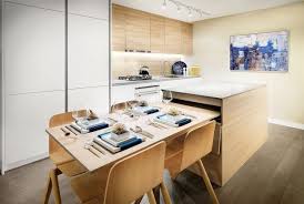 The Riversky Display Suite Showcases A Dining Table That 8217 S Hidden In The K Kitchen Island Dining Table Apartment Kitchen Island Stools For Kitchen Island