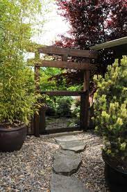 Oriental Style Gate And Arbor With Stone Walkway Garden Entrance Japanese Garden Stone Walkway