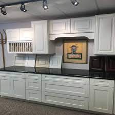 First, the kitchen cabinetry was updated using our refacing method. Overland Park Kitchen Cabinets Premium Cabinets
