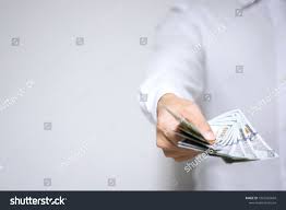 Businessman Holding Dollar Money And Giving Money To You With Copy Space Banker With Money In Hand Displayin Dollar Money Graphic Design Business Business Man