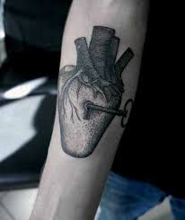 A heart tattoo is a good way to show your love for bae or your bff, and this sweet design is anything but cheesy. 100 Ink Black Lock Heart Key Arm Tattoo Design 1080x1282 2021