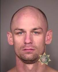 Police arrest man for allegedly pointing rifle