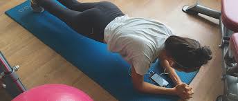 A horizontal bar suspended above the ground. 6 Core Exercises To Ease Lower Back Pain Daily Burn
