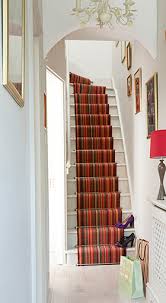 Striped stair runner designed with brintons carpet in cream, black and red stripes. Up Your Stripes With A Stair Runner By Louis De Poortere Interior Bulletin