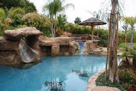Island pools of madison & brandon, ms specializes in custom designed gunite pools & spas, as well as fountains, waterfalls & other water features. 75 Beautiful Tropical Pool Pictures Ideas July 2021 Houzz