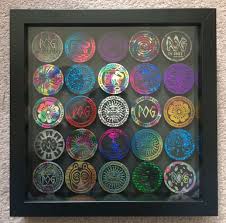 Framed Pog Slammers A Combo Of Beauty And Nostalgia Upcycle Toys Crafty Projects Boredom Cure