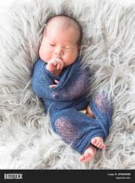 If she has any abdominal pain in the next few days, you can consult a pediatrician or surgeon for further evaluation. One Week Newborn Asian Image Photo Free Trial Bigstock