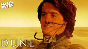 Mackenzie (Benedict Cumberbatch) reluctantly calls off the attack after  Schofield (George MacKay) forces his way in to deliver the order.