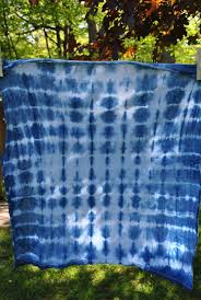 After dyeing just about every white article of clothing in sight, our blue stained fingers excitedly uploaded the tutorial tie a knot above the fabric. Shibori Tie Dye Folding Techniques