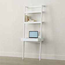 That means this desk has only two legs instead of four, creating a sleek there are three shelves, with the lowest shelf serving as a working area. Cb2 Sawyer White Leaning Desk