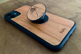 Carry your cards on your mobile phone securely with this popwallet from popsockets. Wooden Phone Holder Stand With Engraved Artworks Buko