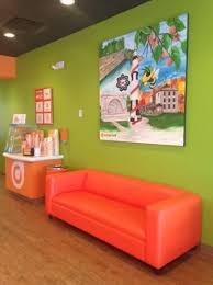 A couch and sofa are very different. Sit A Spell And Enjoy Your Froyo Our Orange Couch Is Calling Your Name Picture Of Orange Leaf Frozen Yogurt Bedford Tripadvisor