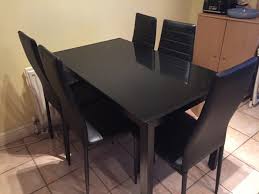 Baking soda may scratch the surface of glass stove tops. Black Glass Top Dining Table And Chairs For Sale In Clondalkin Dublin From Evergreenlpm