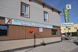 Edgewater Hotel Whitehorse Overlooking The Majestic Yukon River And Historic White Pass Railway The Edgewater Hotel Co Edgewater Hotel Yukon River Whitehorse