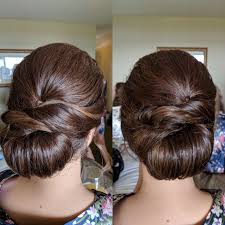 A Low Chignon For An Elegant Smooth Bridal Updo Wedding Hairstyles For Long Hair Long Hair Wedding Styles Hair Styles