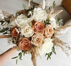 Can someone create a custom wedding bouquet with white flowers, pastel  auburn, beige, and greenery for a September 2025 wedding?