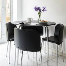 Each piece is made from metal with engineered wood surface details. Round Dining Table Set For Small Spaces Novocom Top