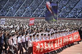 North Korea Holds Mass Rally to 'Annihilate' US and Defy Biden - Bloomberg