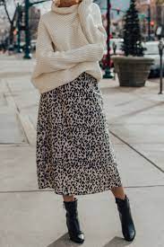 How To Style Oversized Sweater With A Leopard Skirt Leah Behr Leopard Print Skirt Chic Clothing Style Trendy Skirts