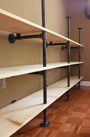 Single extra long various depth rustic floating shelf, two iron pipe brackets, farmhouse kitchen shelf, rustic pantry storage. How To Build Plumbing Pipe Shelves The Cavender Diary
