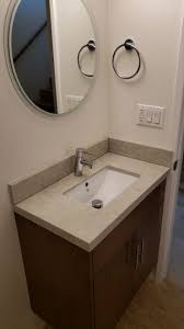 If you want to stick to an earthy color scheme that's visually appealing and works well with wood accents, consider a mustard yellow shade. Cream Brown And Beige Color Palette For A Warm Bathing Space Modern Bathroom Los Angeles By Mdm Custom Remodeling Inc Houzz