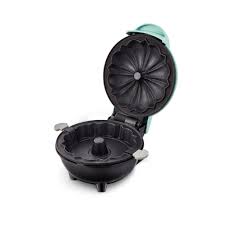 Dash mini bundt® cake maker, lifter tool, and recipe guide. Dash Mini Bundt Cake Maker