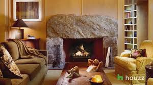 The immediate exterior walls surrounding your fireplace are the easiest place to start. A Crackling Virtual Fire Makes These Beautiful Rooms Warm And Cozy Youtube