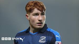 Tom Smith: Cheltenham sign ex-Swindon Town midfielder