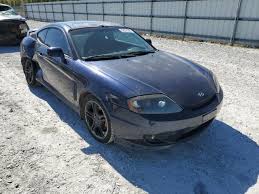 Image result for Ebony Black 2005 Tiburon
