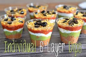 Individual 6 Layer Dips With Refried Beans Taco Seasoning Wholly Guacamole Sour Cream Salsa Shredded Ch Layered Dip Recipes Recipes Easy Appetizer Recipes