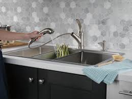 For a more modern look, you can opt for a smooth finish, and for a. Single Handle Pull Out Kitchen Faucet With Soap Dispenser B4311lf Sssd Delta Faucet