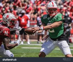 Football Handoff Photos, Images & Pictures