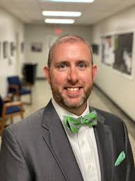 Please join us in...