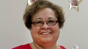 SHE ENJOYS HELPING PEOPLE