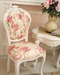 Custom directors chair covers in white, pink and more. Shabby Chic Chair With Pink Floral Pattern And White Side Table Shabby Chic Decor Shabby Chic Chairs Shabby Chic Interiors