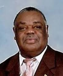 John E. Dixon (1951-2014)