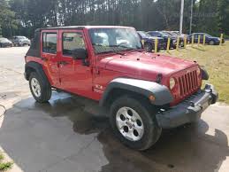 Image result for Flame Red 2009 Jeep