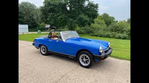 Image result for Tahiti Blue 1977 MG