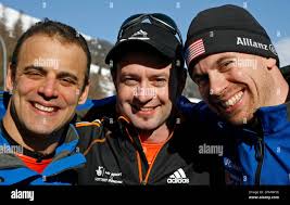 Winner Kristan Bromley from Britain, center, Zach Lund from the United  States, second placed, left, and Eric Bernatos from United States, third  placed,