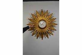 They might be part of the background of various mid century pieces. Large Giltwood Sunburst Clock Mid 20th Century Retro Station