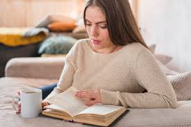 Download Young Beautiful Woman Holding Cup Of Coffee Cup Reading Book For Free Coffee Cup Reading Young And Beautiful Beautiful Women