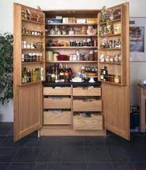 2 large storage areas behind both the upper and lower framed doors, featuring two fully. A Freestanding Pantry For Small Spaces Your Projects Obn Stand Alone Kitchen Pantry Pantry Design Kitchen Pantry Design