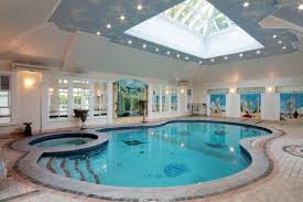 Indoor Swimming Pools Bring Together Aesthetics And Ergonomics In A Breathtaking Manner Browse Our Ideas And Le Luxusschwimmbader Hallenbad Schwimmbad Designs