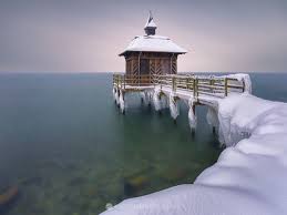 pavillon de bain small bath house in icy swiss winter lake neuchatel switzerland small bath neuchatel lake